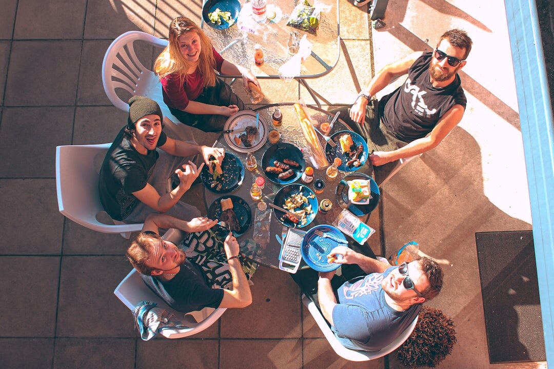 Diverse group of professionals in collaborative discussion at a round table