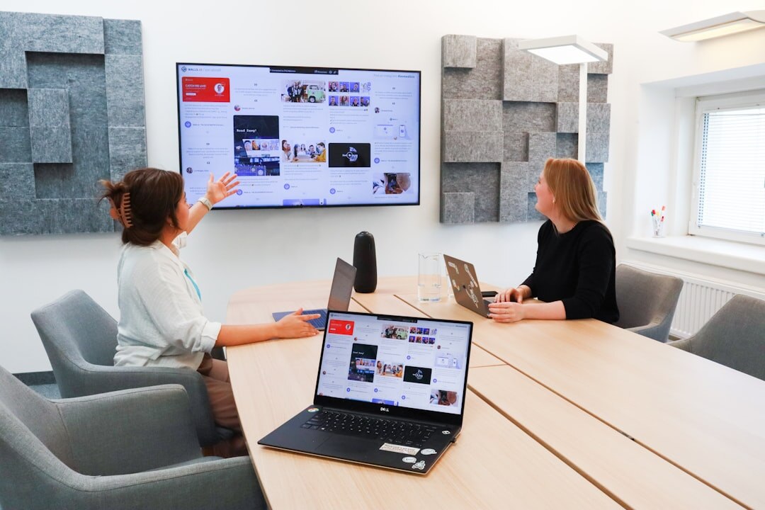 Conference room with people engaged in public dialogue and discussion